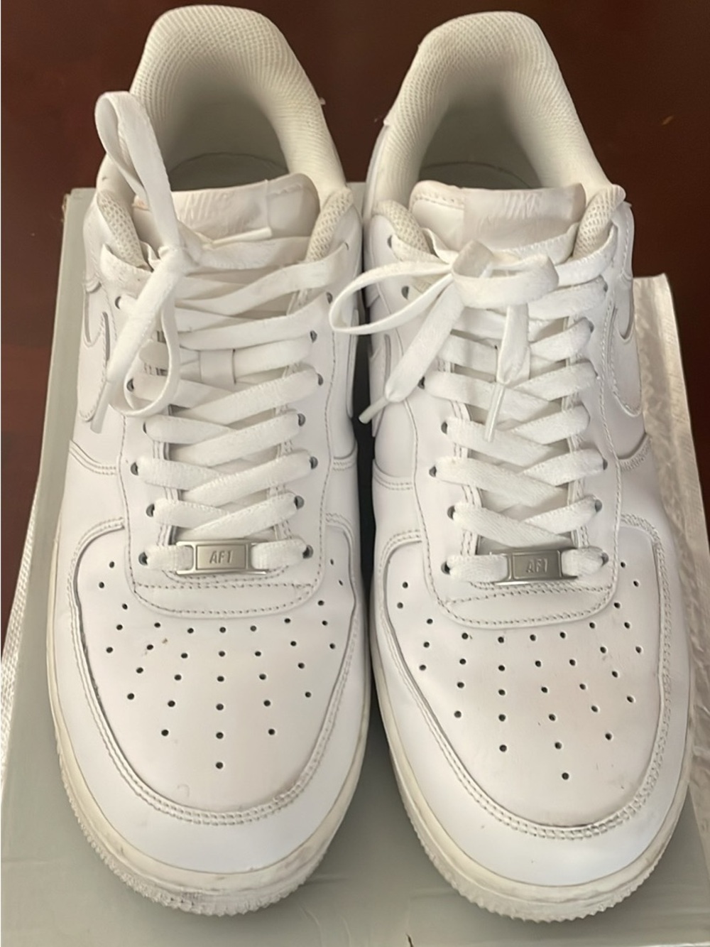 11.5 Nike Air Force 1 '07 Low White sneakers featuring an all-white leather u
